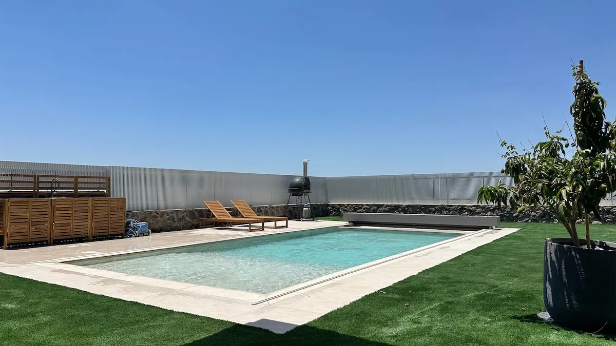 Pool, lawn, sun loungers and outdoor seating